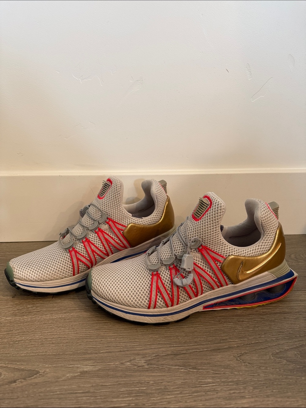 Nike Women's White & Gold Sneakers with Coral Accents